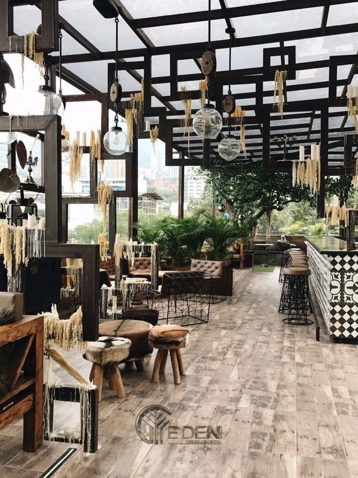  Thiết kế quán cafe đẹp ngang 4m với phong cách “Xanh” với mô hình quán cafe mở, sử dụng đồ nội thất với chất liệu gỗ tạo sự ma mị, huyền bí