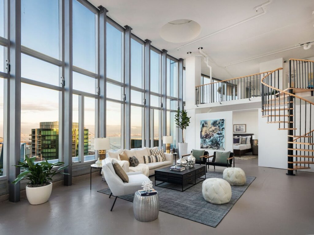 Mẫu thiết kế căn hộ Duplex mang phong cách tối giản, tiết chế đồ dùng nội thất, giữ trọn vẻ đẹp nguyên bản của căn Duplex thông tầng.